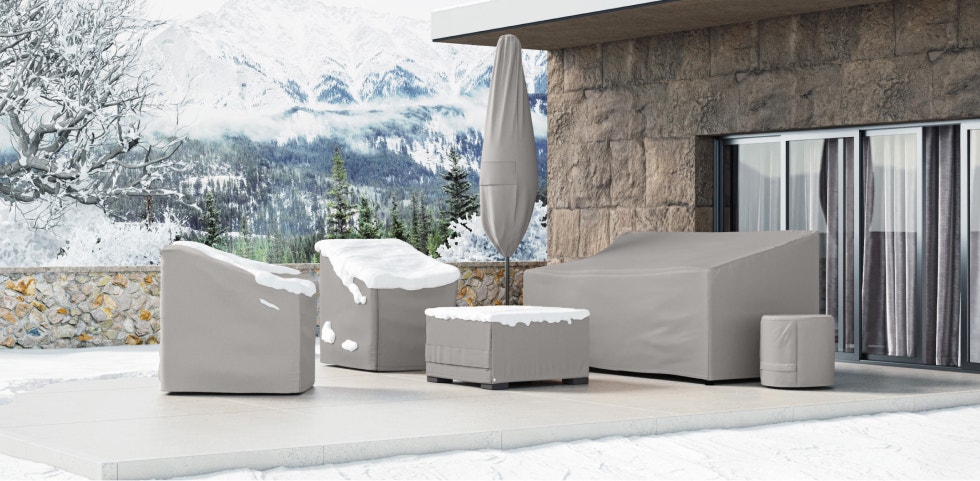 Winter patio furniture covers with snow on top