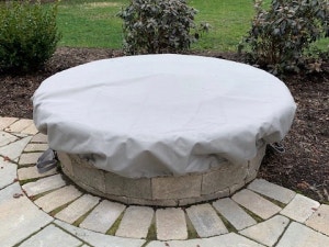 Grey fire pit cover