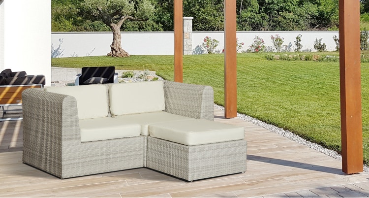 Outdoor sofa with new cushions on a patio