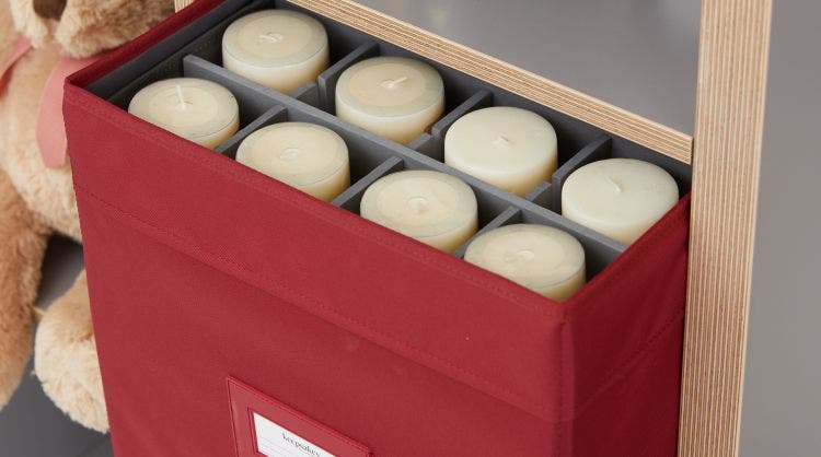 Candles stored in a box with dividers