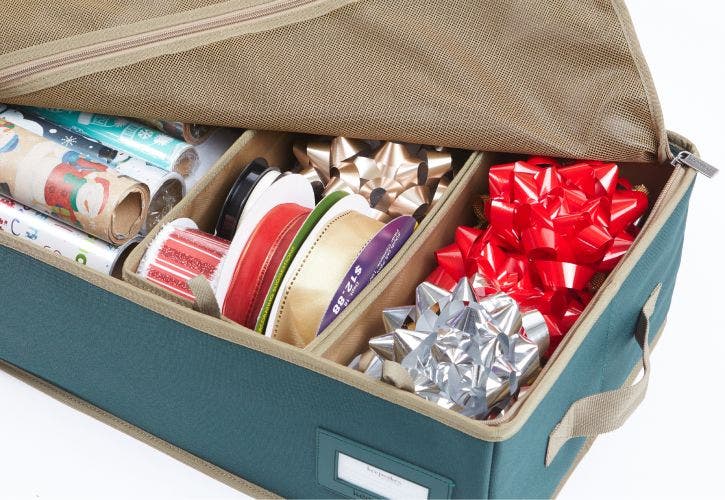 Gift wrap storage bag designed to fit multiple rolls of wrapping paper and decorations