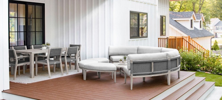 Outdoor round daybed and a dining table on a patio