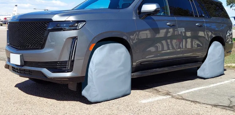 Light blue tire cover on an SUV