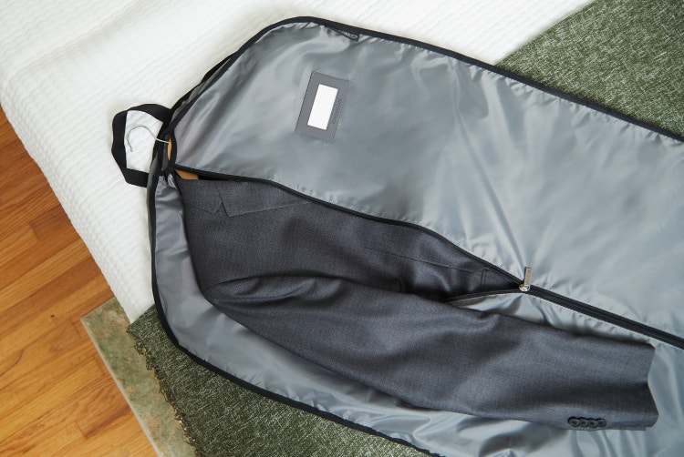 garment bag with a suit inside
