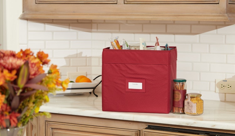 Cube storage bin with kitchen items