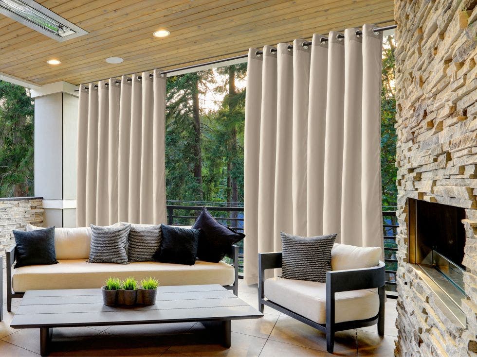 Outdoor curtains hung across a large space