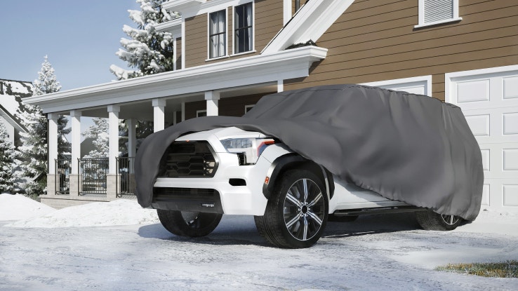 Winter SUV cover in snow